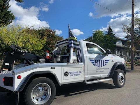 Elite Towing truck on a clear sunny day