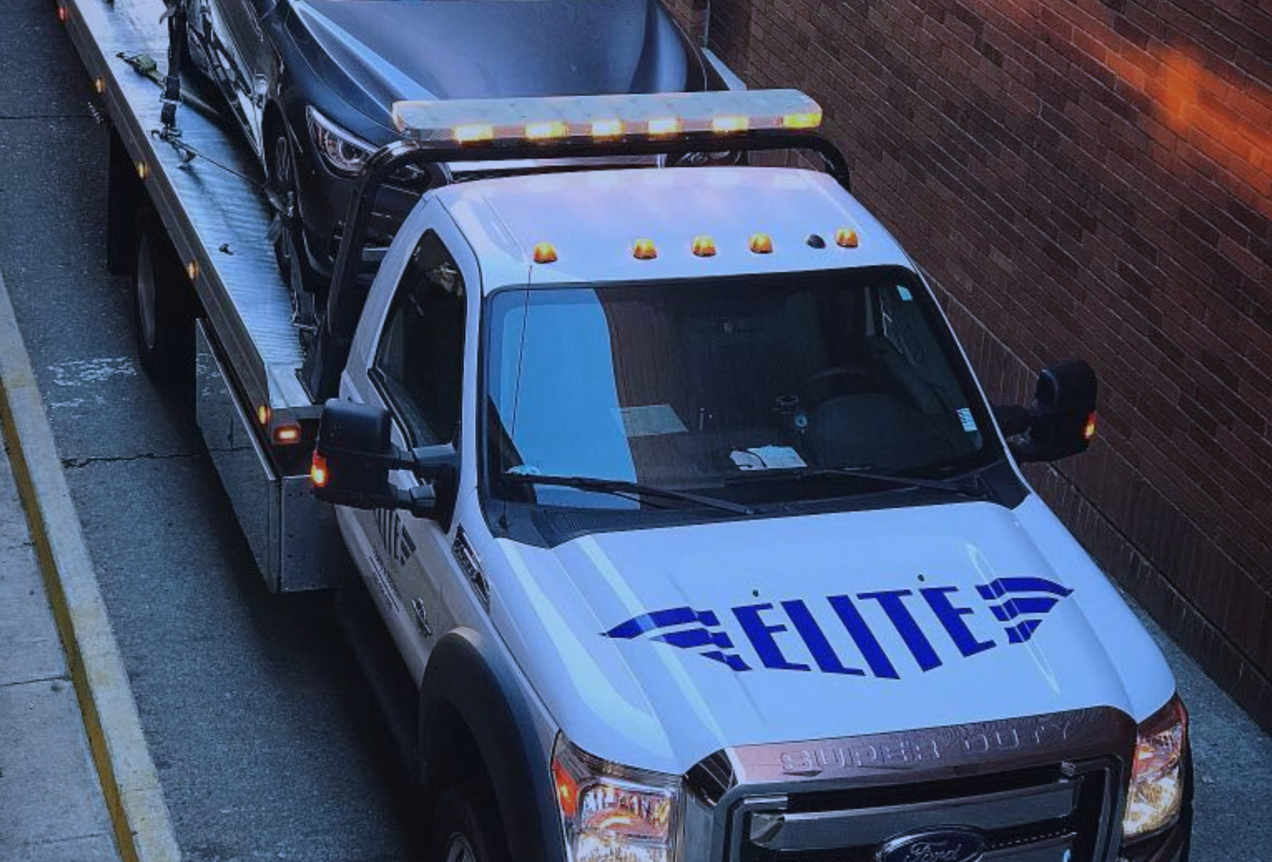 Elite Towing & Recovery truck on the job